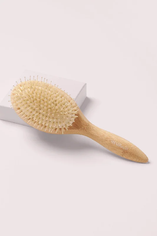 The Glossifier Boar Bristle Bamboo Brush